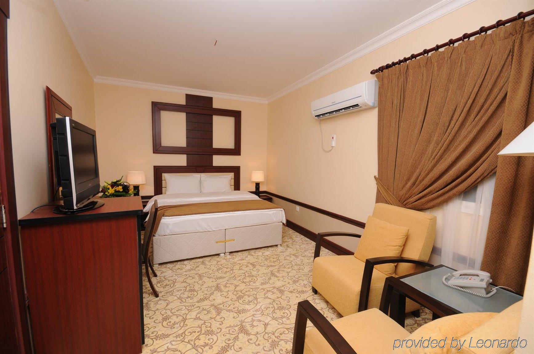 La Villa Palace Hotel Doha Habitación foto