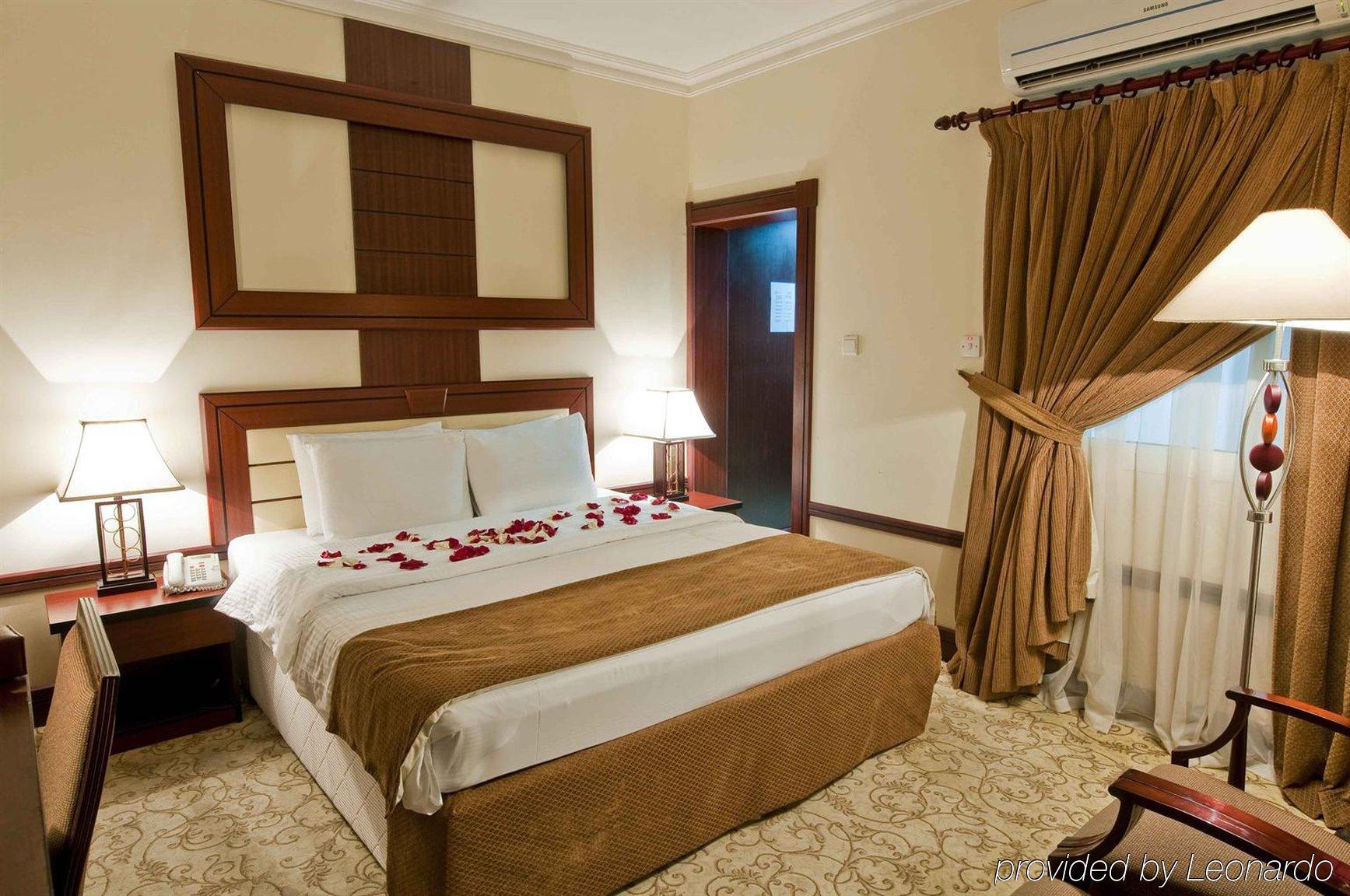 La Villa Palace Hotel Doha Habitación foto